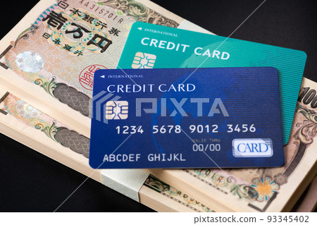 Bills and credit cards black background Bills and credit cards black background 93345402