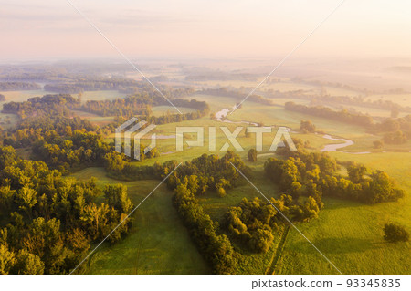 Nature scenery with floodplains and riparian forests illuminated by morning sun 93345835