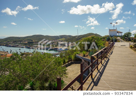 chapel on top of the hill, overlooking the city of Cabo Frio in Rio de Janeiro state, Brazil. Araruama lagoon on background 93347834