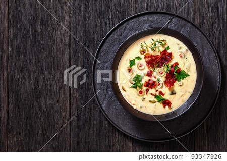 Beer cheese soup in bowl, top view Beer cheese soup in bowl, top view 93347926