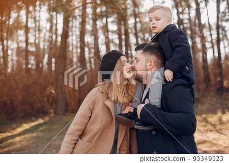 Family with cute little son. Parents with child in a park 93349123