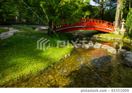 Red  japanese  bridge  in   japanese garden of Albert Kahn Museum 93351009