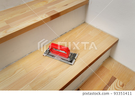 Home renovation, wooden stairs sanding Home renovation, wooden stairs sanding 93351411