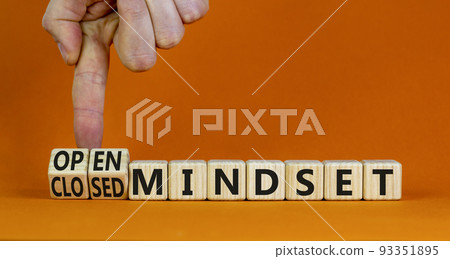 Open or closed mindset symbol. Businessman turns wooden cubes and changes concept words closed mindset to open mindset. Beautiful orange background copy space. Business open or closed mindset concept. Open or closed mindset symbol. Businessman turns wooden cubes and changes concept words closed mindset to open mindset. Beautiful orange background copy space. Business open or closed mindset concept. 93351895