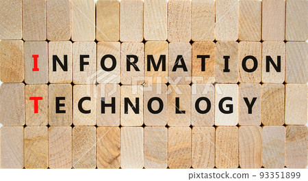 IT information technology symbol. Concept words IT information technology on wooden blocks on a beautiful wooden background. Business IT information technology concept, copy space. IT information technology symbol. Concept words IT information technology on wooden blocks on a beautiful wooden background. Business IT information technology concept, copy space. 93351899
