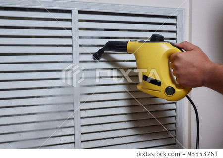 Cleaning company. girl with a steam cleaner brushing the home battery. We begin cleaning of the apartment. House worker. Leisure in gloves. We kill microbes and rust. Cleaning company. girl with a steam cleaner brushing the home battery. We begin cleaning of the apartment. House worker. Leisure in gloves. We kill microbes and rust. 93353761