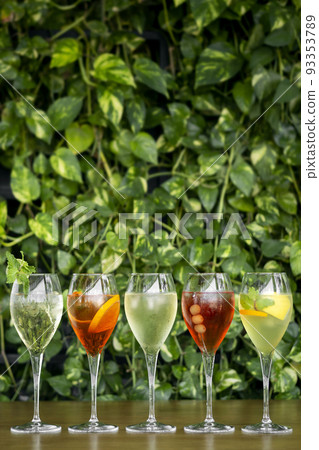 mixed spritzer wine cocktails selection with fruit in outdoor bar mixed spritzer wine cocktails selection with fruit in outdoor bar 93353789