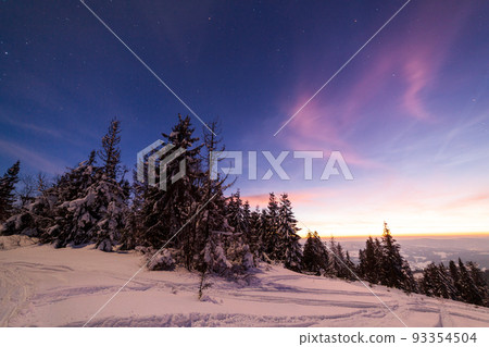 Magical winter landscape with snow covered tree. Vibrant night sky with stars and nebula and galaxy. Deep sky astrophoto. Magical winter landscape with snow covered tree. Vibrant night sky with stars and nebula and galaxy. Deep sky astrophoto. 93354504