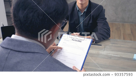 Job HR applicants having an interview with Human resource manager jobs interviewing with confident candidate at business firm office give cv resume. Job Interview with headhunter agent and applicant Job HR applicants having an interview with Human resource manager jobs interviewing with confident candidate at business firm office give cv resume. Job Interview with headhunter agent and applicant 93357593