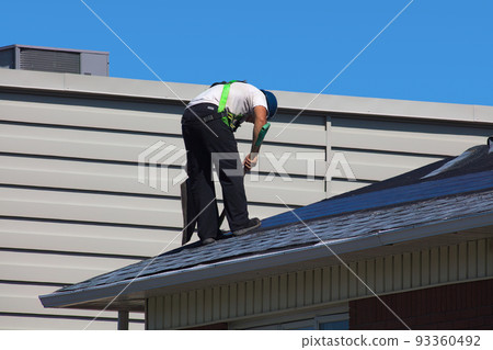 roofer working on roof repair men at work fixing rooftop roofer working on roof repair men at work fixing rooftop 93360492
