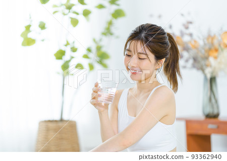 Young woman (hydration, yoga, stretching Young woman (hydration, yoga, stretching 93362940