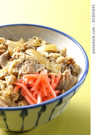Simple gyudon topped with red pickled ginger Simple gyudon topped with red pickled ginger 93365845