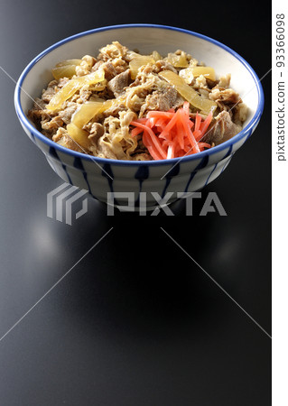 Shoot a simple beef bowl with red ginger on a black background Shoot a simple beef bowl with red ginger on a black background 93366098