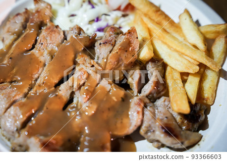 Steak and french fried food street by foodtruck, Bangkok, Thailand. 93366603