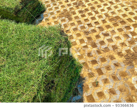 gray color stone brick block floor tile with green grass and sand as background or texture. 93366636