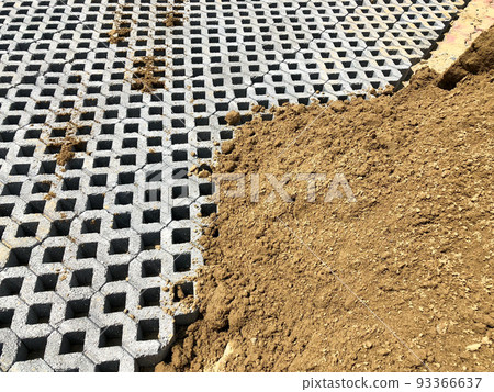 gray color stone brick block floor tile with green grass and sand as background or texture. 93366637