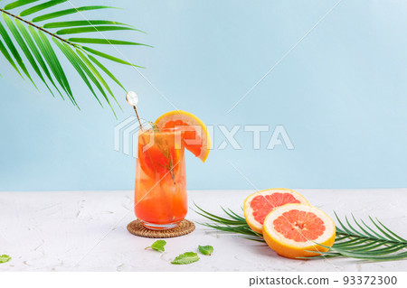summer background with grapefruit ade, juice drink with grapefruits summer background with grapefruit ade, juice drink with grapefruits 93372300