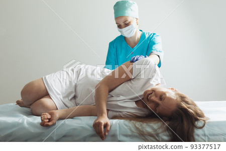 Doctor process epidural nerve block for pregnant woman Doctor process epidural nerve block for pregnant woman 93377517