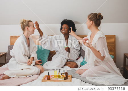 The young women are having a spa party The young women are having a spa party 93377536