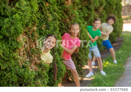 Girls and boys jumping out of bushes unexpectedly 93377988