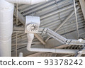 Ventilation system under ceiling of modern warehouse or shopping center. Metal piping for air conditioning 93378242