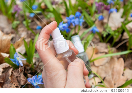 Hand spray from clear pump bottle in blue flowers 93380943