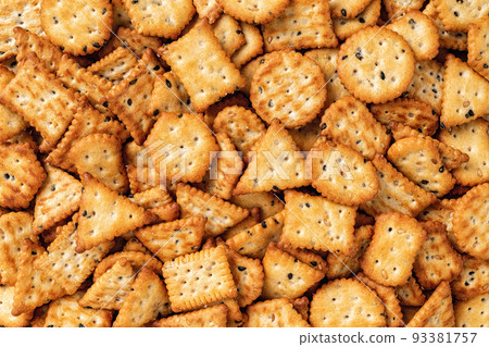 Saltine cracker background. Texture of salty crackers. 93381757