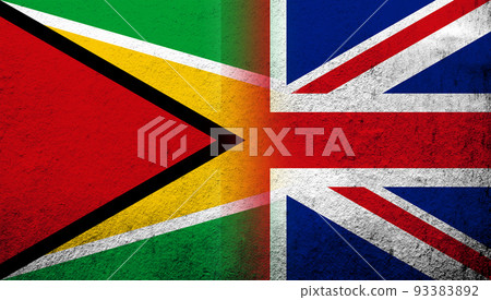 National flag of United Kingdom (Great Britain) Union Jack with Republic of Guyana National flag. Grunge background National flag of United Kingdom (Great Britain) Union Jack with Republic of Guyana National flag. Grunge background 93383892