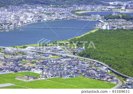 Beautiful Niji-no-Matsubara and the townscape of Karatsu seen from Kagamiyama Nishi Observatory (Karatsu City, Saga Prefecture) 93389631