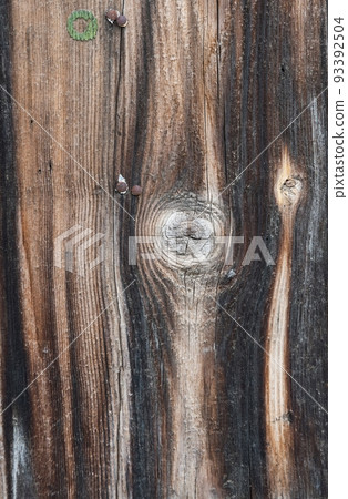 Photography of textured hardwood no people picture as a design of perfect simplicity of a death material with cruft black element, ugly dirty, cracked, rustic surface. Studio vertical photography. 93392504