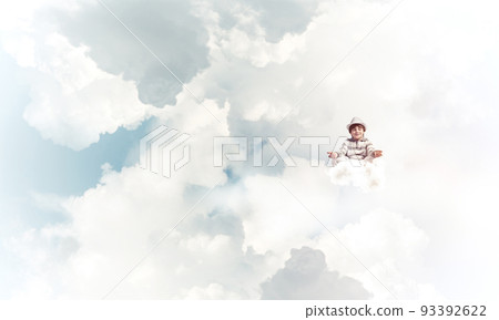 Little boy keeping mind conscious. 93392622