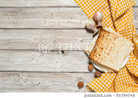Jewish holiday Passover banner design with wine, matzo on wooden background. 93394548