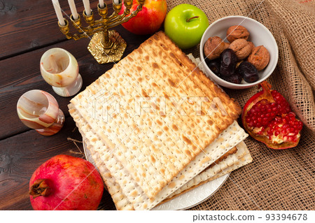 Jewish holiday Passover banner design with wine, matzo on wooden background. 93394678