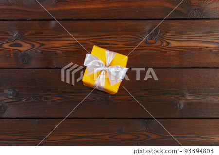 gift box on wooden background gift box on wooden background 93394803