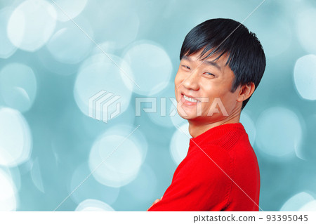 Handsome young asian man smiling 93395045