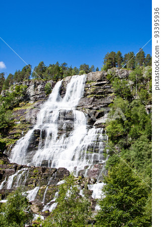 View of Tvindefossen or Tvinnefossen waterfall near Voss in Norway 93395936