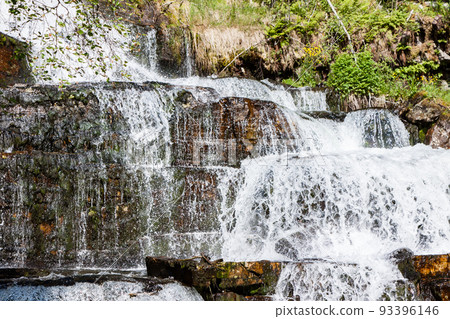 View of Tvindefossen or Tvinnefossen waterfall near Voss in Norway 93396146