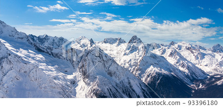 Panorama of winter snowy mountains in Caucasus region, Russia 93396180