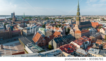 Beautiful aerial view of Riga city, the capital of Latvia. Aerial view of the St. Peter's Church in the center of the old town. Beautiful aerial view of Riga city, the capital of Latvia. Aerial view of the St. Peter's Church in the center of the old town. 93396781