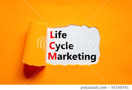 LCM lifecycle marketing symbol. Concept words LCM lifecycle marketing on white paper on a beautiful orange background. Business and LCM lifecycle marketing concept. Copy space. 93399791
