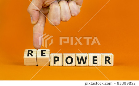 Power or repower symbol. Businessman turns wooden cubes and changes concept words Power to Repower. Beautiful orange table orange background. Business ecological power or repower concept. Copy space. Power or repower symbol. Businessman turns wooden cubes and changes concept words Power to Repower. Beautiful orange table orange background. Business ecological power or repower concept. Copy space. 93399852