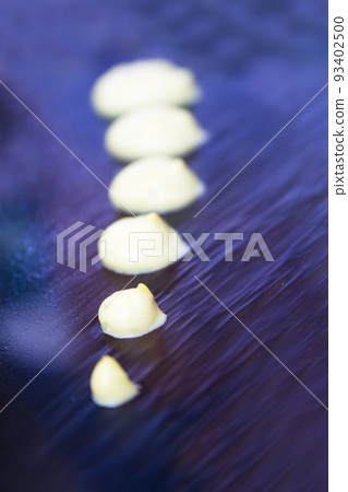 Assorted sushi food on a black slate plate 93402500