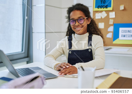 Young Black Schoolgirl with Laptop Young Black Schoolgirl with Laptop 93406557