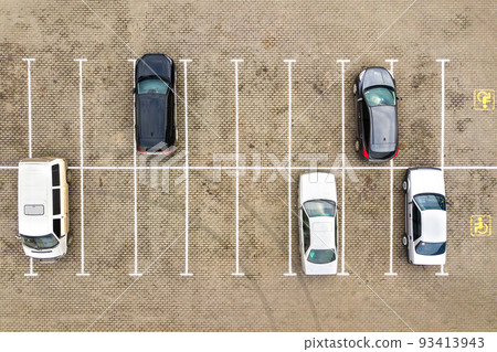 Top down aerial view of many cars on a parking lot of supermarket or on sale car dealer market. Top down aerial view of many cars on a parking lot of supermarket or on sale car dealer market. 93413943