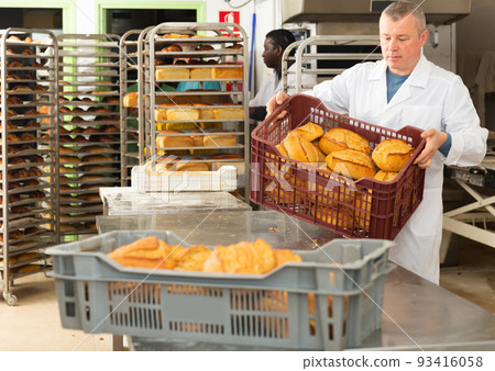 Baker sorts finished products at the bakery 93416058
