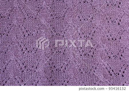 Background texture of violet pattern knitted fabric made of cotton or wool closeup Background texture of violet pattern knitted fabric made of cotton or wool closeup 93416132