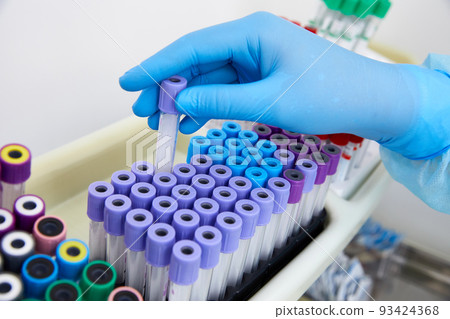 Scientist working with blood sample in laboratory 93424368