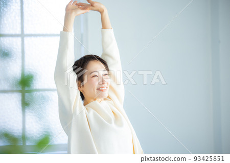 A woman by the window A woman by the window 93425851