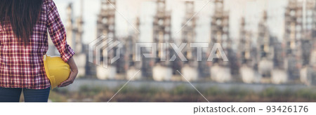 Banner Woman worker hands holding hardhat yellow work helmet Construction Engineer. Panorama Refinery woman worker industry hand hold yellow worker helmet hard hat. Refinery industry with copy space Banner Woman worker hands holding hardhat yellow work helmet Construction Engineer. Panorama Refinery woman worker industry hand hold yellow worker helmet hard hat. Refinery industry with copy space 93426176