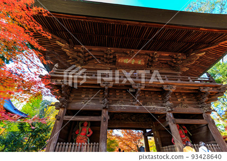 Setagaya Ward, Tokyo, autumn leaves at Kuhonbutsu Joshinji Temple, Niomon Gate 93428640